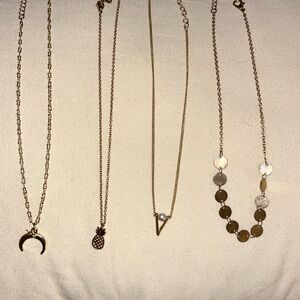 set of four gold dainty necklaces